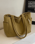 Tilda Tote Bag featuring a stylish ribbed design, spacious interior, and versatile use for everyday activities. - 7