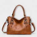 Mira Crossbody Bag made from premium Swiss leather featuring an elegant design, perfect for stylish women on the go. - 1
