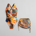 Abstract tie-dye swimsuit and sarong skirt set - front