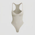 Bella deep-V racerback bodysuit pearl river flat lay