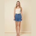 Breezy blue denim pleated A-line mini skirt front view