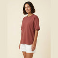 Elysian oversized t-shirt brick red on model