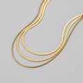 Gold multi layered chain necklace