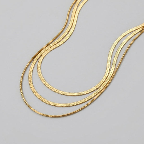 Gold multi layered chain necklace