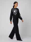 Jenna flower embroidered knit set black - side on model