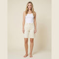 Luna ivory high-rise wide-leg denim Bermuda shorts front on model