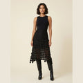 Luna black laser-cut disc high-waist midi skirt front on model