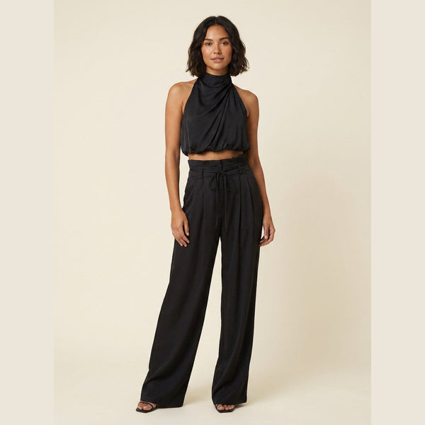Luxe halter crop top and high-waist pants co-ord set, black, on model
