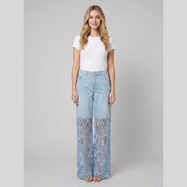 Luxe wide-leg light blue denim jeans with lace inserts, on model front