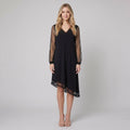 Matilda black evening dress sheer sleeves on model