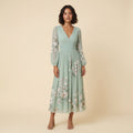 Mira sage green floral midi dress front on model