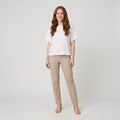 Mira white loose-fit linen top front on model