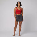 Mira red ribbed crop and charcoal skort set front on model