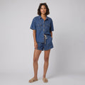 Olivia denim shirt and shorts set in blue on female model