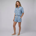 Olivia denim shirt and shorts set in sky light wash on female model