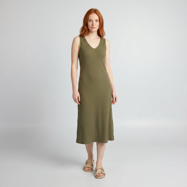 Svelte olive green deep V-neck ribbed bodycon midi dress on model